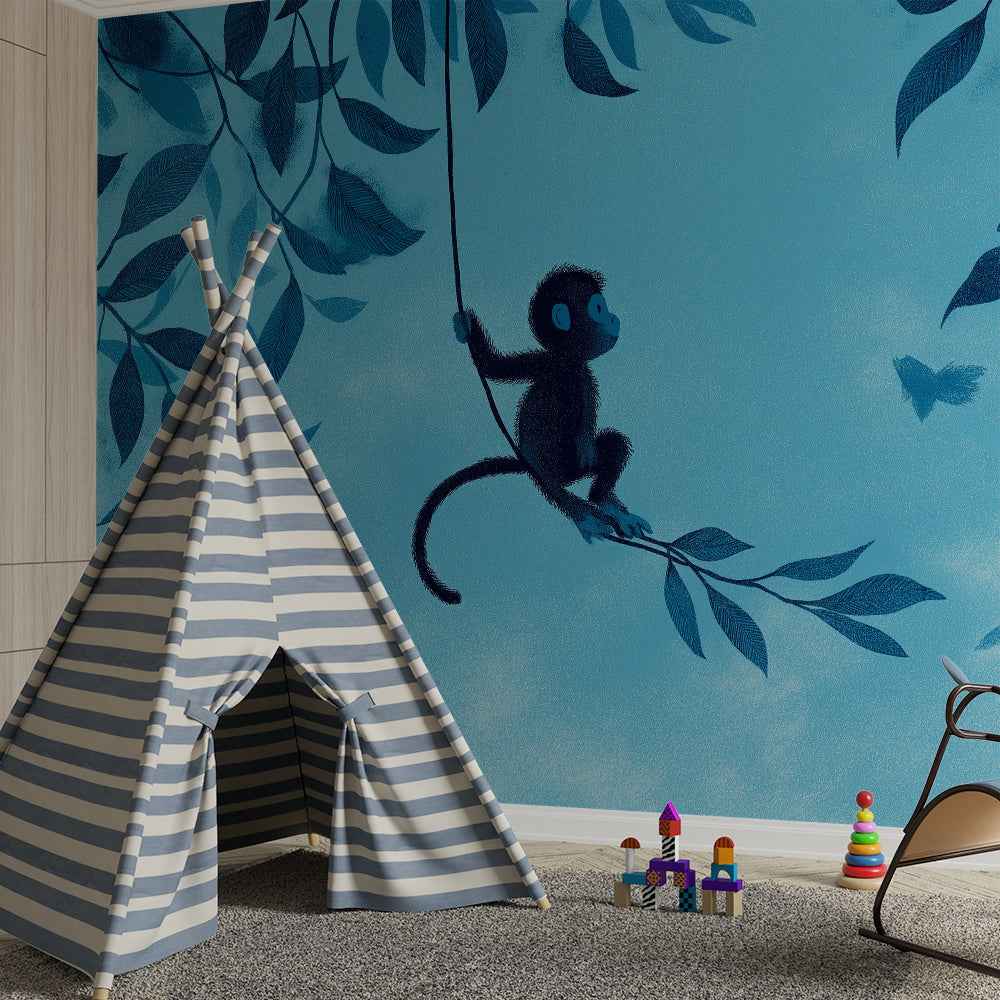 Kids-Mundo blue jungle monkey mural brightening a playroom wall with vine and leaf detail.