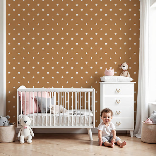 Kids-Mundo mini stars terracotta wall mural styled behind a cot in a cosy nursery