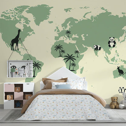 Kids-Mundo mint green world map wall mural bringing palm trees and penguins into a children's playroom