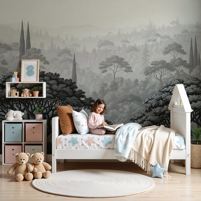 Kids-Mundo grey woodland wall mural with cypress trees behind a cot in a peaceful nursery