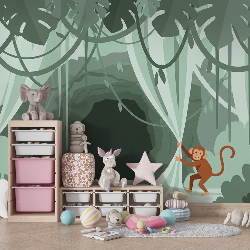 Kids-Mundo jungle vine and cave wall mural brightening a playroom wall with toy storage nearby.