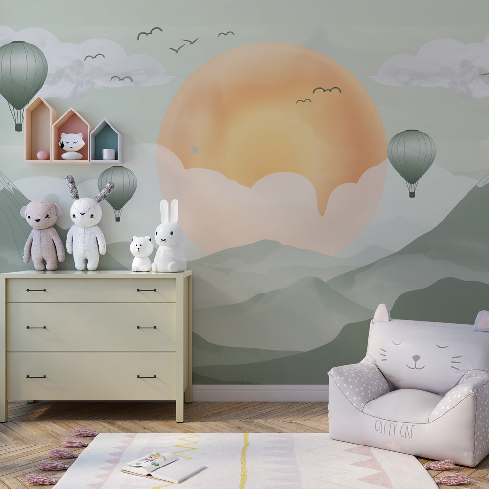 Kids-Mundo mountain and balloon wall mural covering a feature wall in a bright playroom