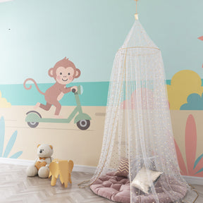 Coastal monkey scooter wallpaper creating tropical atmosphere in kids bedroom