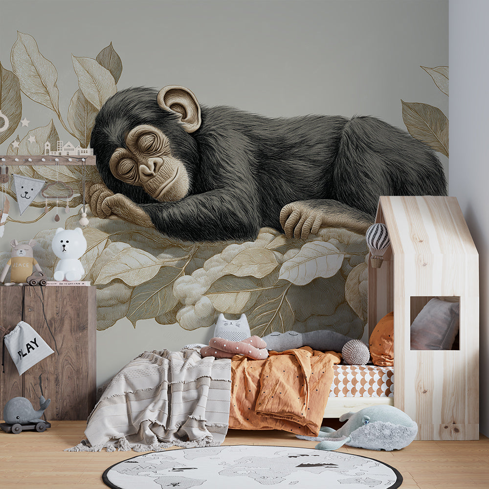 Kids-Mundo sleeping monkey wall mural styled behind a reading nook in a playroom