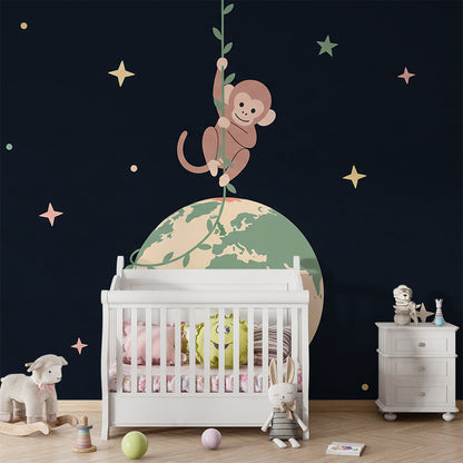 Kids-Mundo monkey swinging from Earth wall mural in a space-themed kids bedroom
