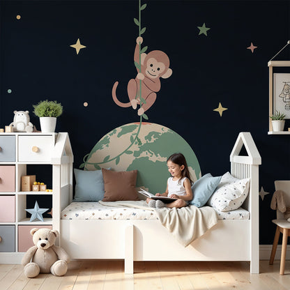 Kids-Mundo monkey space wall mural styled in a deep navy, star-themed nursery