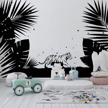 Kids-Mundo black and white tiger wall mural covering a feature wall in a child's bedroom with palm leaves.