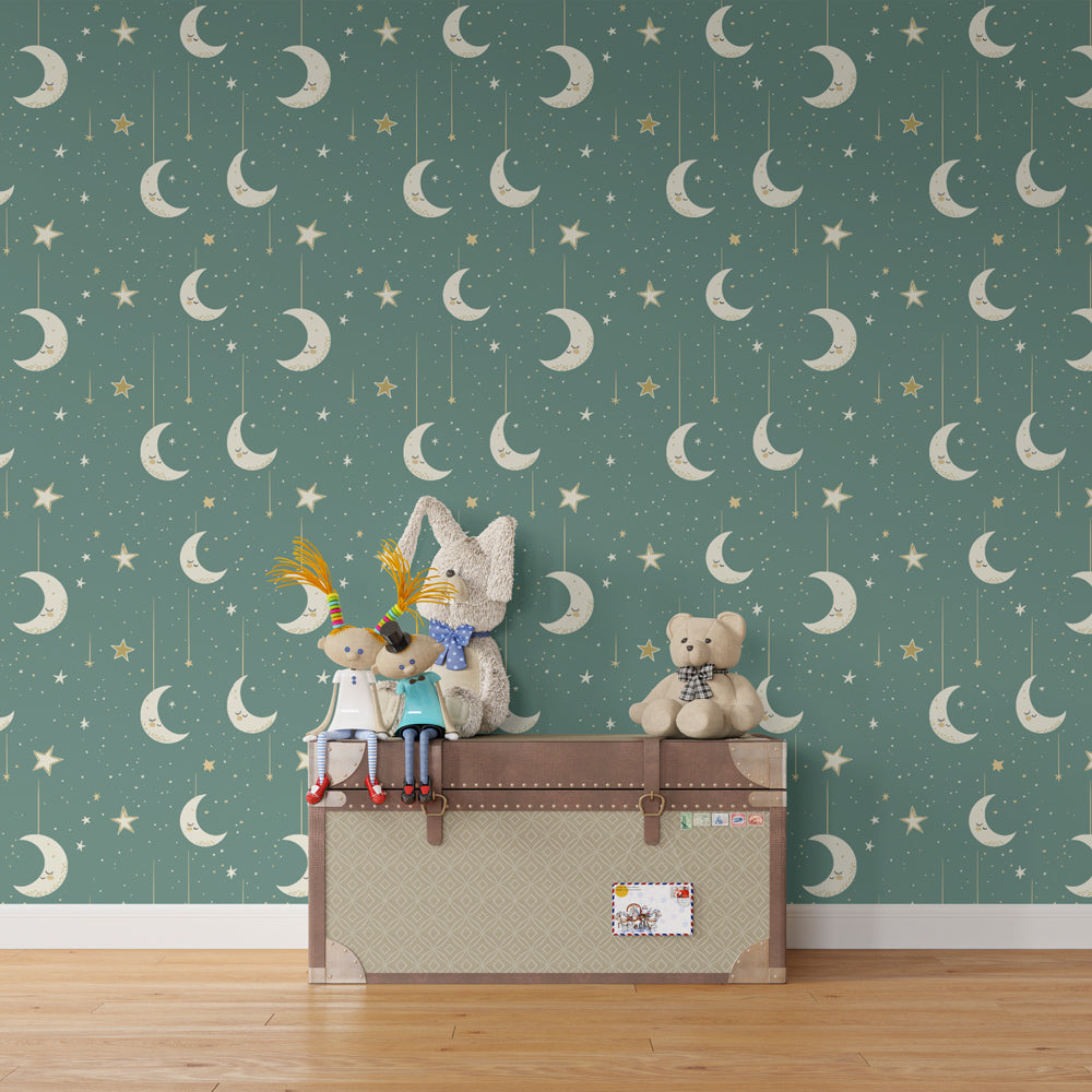 Celestial mural wallpaper with hanging moons and stars in cozy toddler sleep space