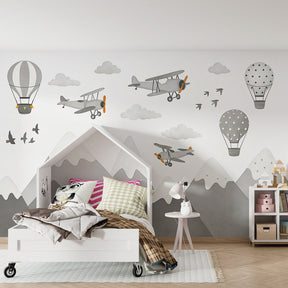 Hot air balloon and vintage plane wallpaper transforming children's playroom space