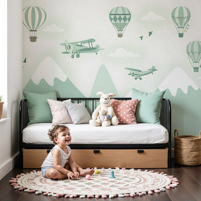 Mountain aviation mural wallpaper with hot air balloons in modern nursery by Kids-Mundo