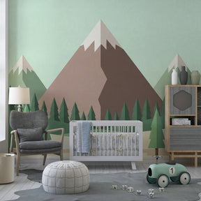 Nature-themed mural wallpaper featuring mountains and trees in contemporary children's playroom setting