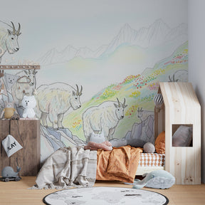 Wild nature goats mural wallpaper in cozy kids playroom with educational mountain decor