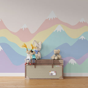Soft mountain wallpaper creating dreamy atmosphere in children's bedroom with natural light