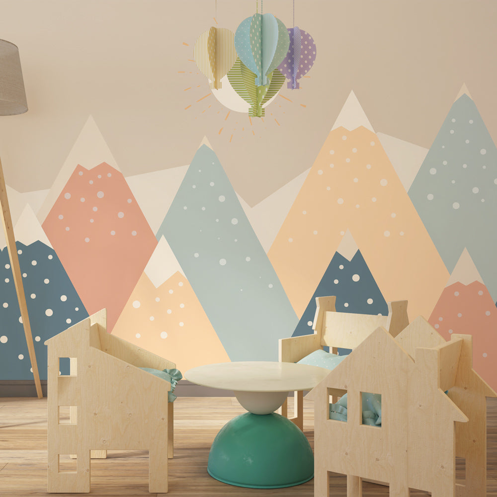 Pastel mountain wallpaper creating serene children's bedroom with Nordic decor style