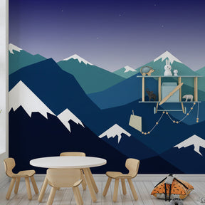 Starry mountain wallpaper transforming nursery into adventure sanctuary with soft blue tones