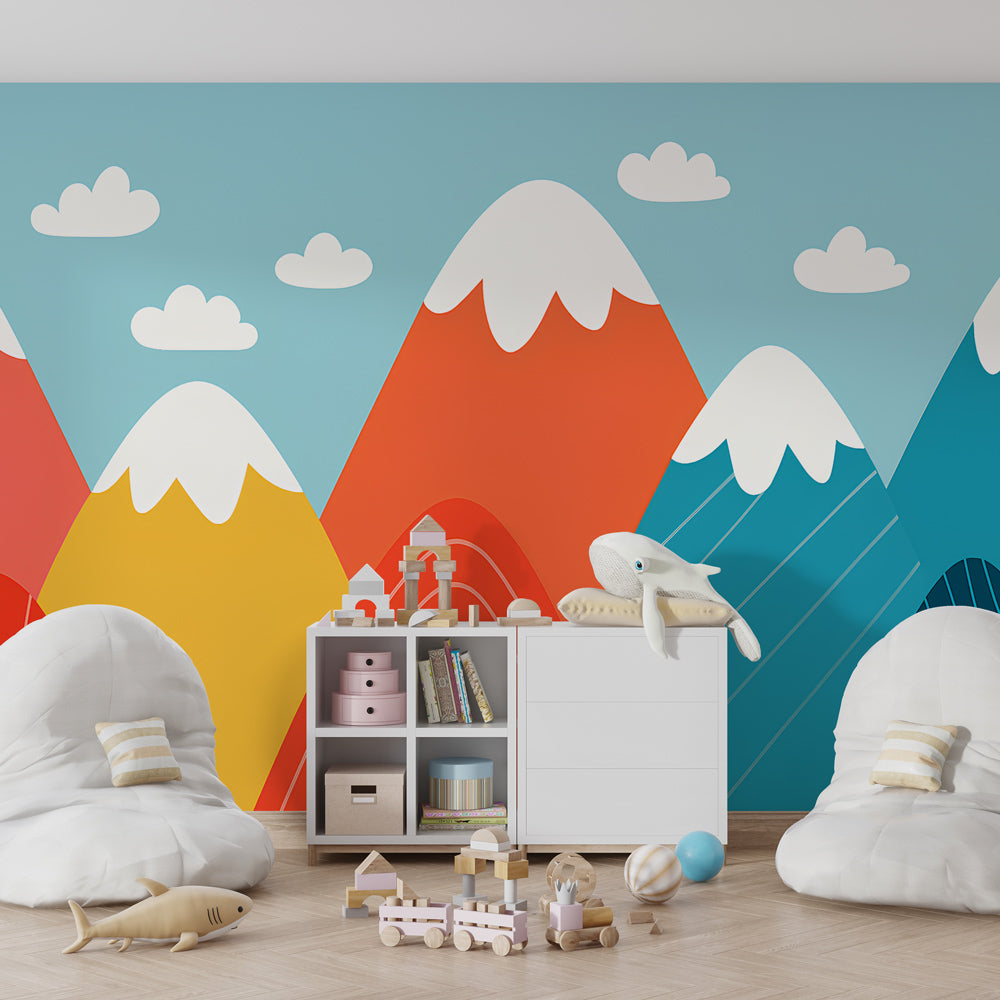 Mountain peaks wallpaper creating adventure-themed nursery with vibrant colors