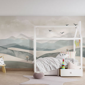 Mountain mural wallpaper transforming nursery into peaceful sanctuary with birds
