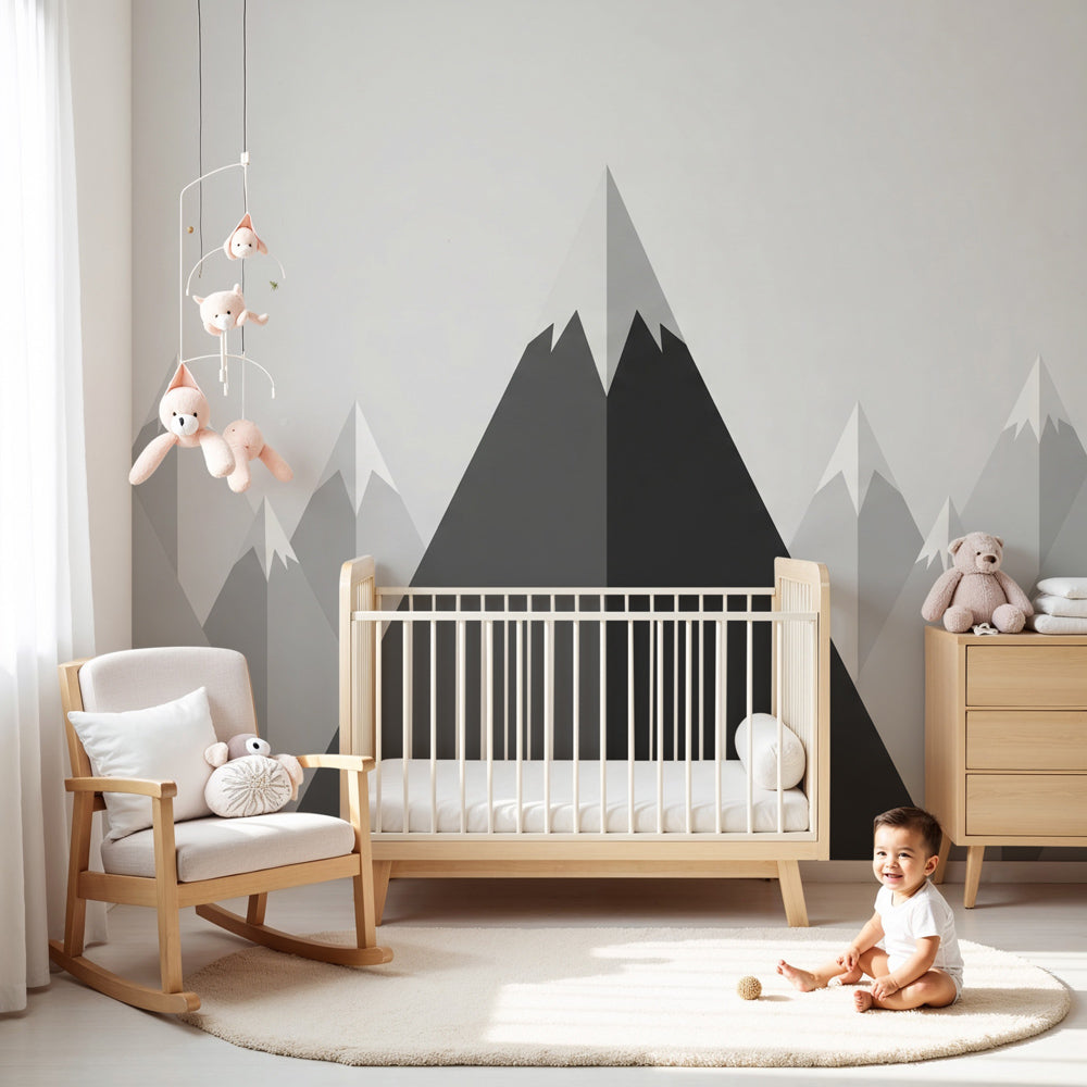 Stylized mountain mural wallpaper in modern nursery with gray geometric peaks by Kids-Mundo