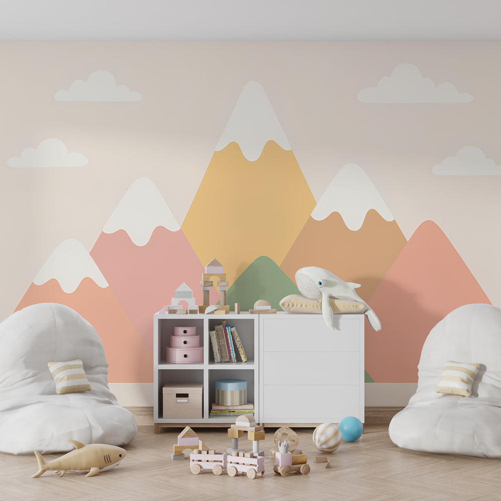 Soft mountain landscape wallpaper transforming kids playroom with calming pastel colors