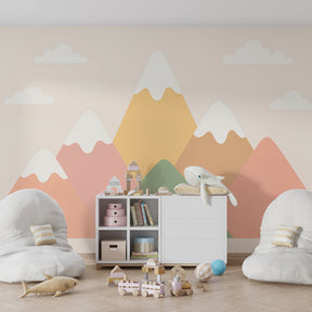 Soft mountain landscape wallpaper transforming kids playroom with calming pastel colors