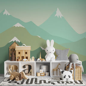 Nature-inspired mountain wallpaper transforming kids playroom with soft green and blue tones