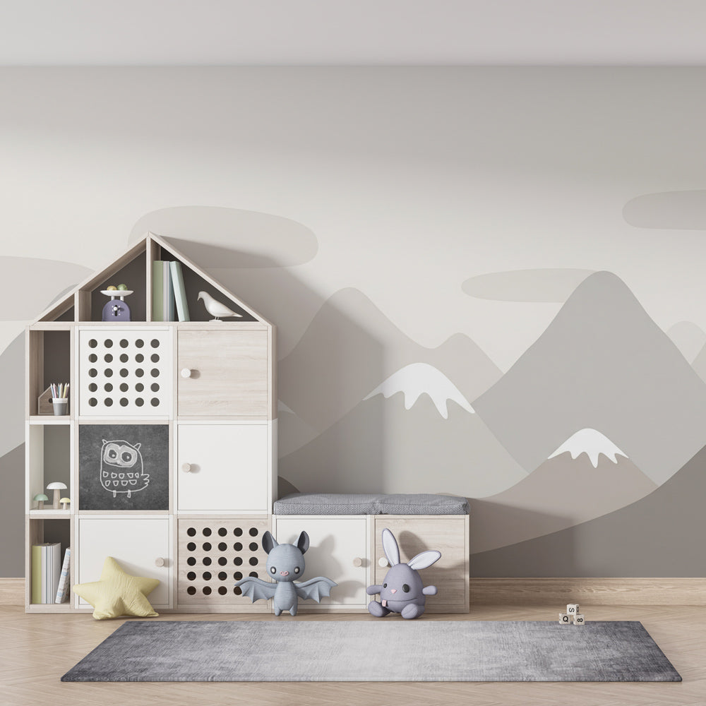 Pastel mountain wallpaper transforming playroom into peaceful adventure space for children