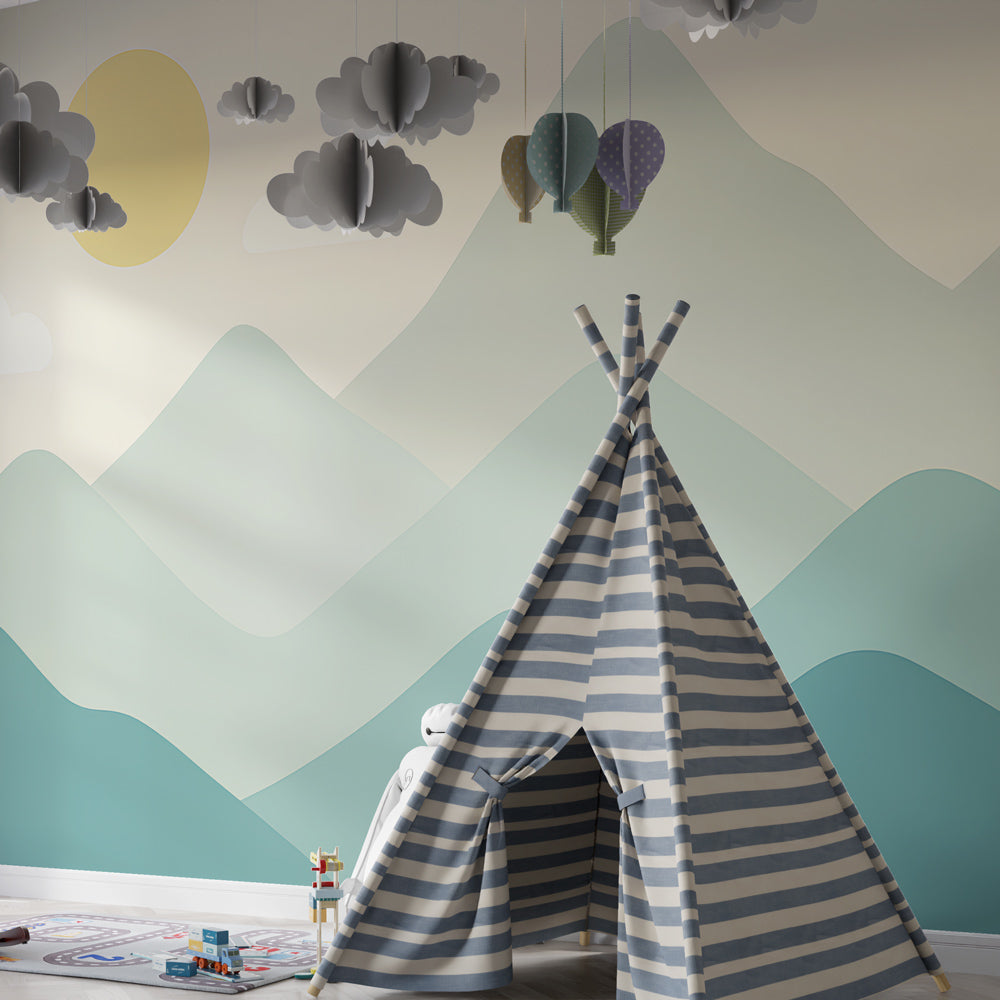 Gentle mountain landscape wallpaper transforming children's bedroom with calming blue and green tones