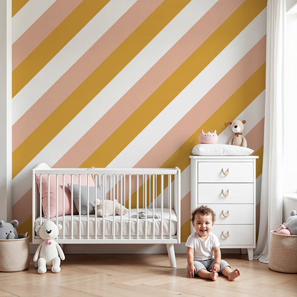 Kids-Mundo mustard and blush diagonal stripe wallpaper mural in a nursery