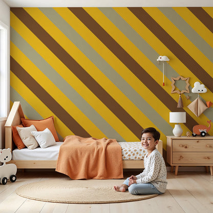 Kids-Mundo mustard and sage diagonal stripe wall mural styled in a warm, sunny nursery.