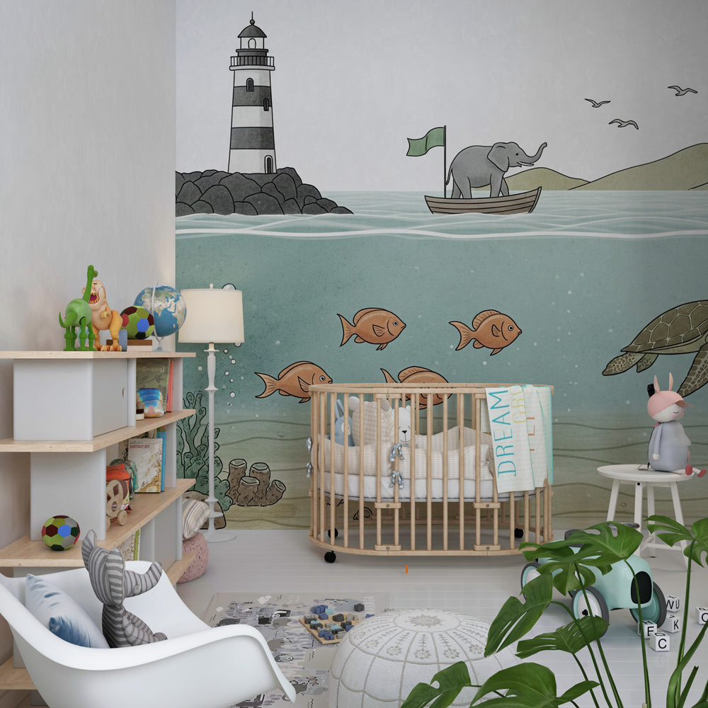 Marine life wallpaper creating underwater themed kids bedroom with elephant boat design