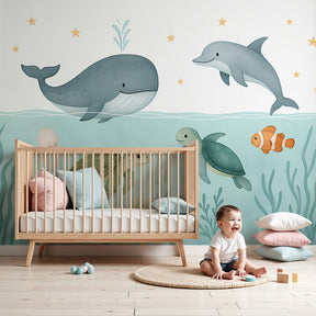 Ocean adventure mural wallpaper with whales and turtles in modern nursery by Kids-Mundo