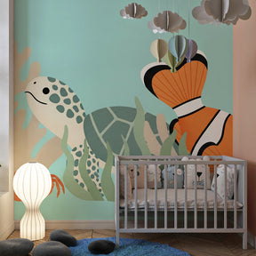 Sea life mural wallpaper transforming children's playroom with turtle and coral reef scene