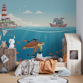 Ocean themed mural wallpaper with elephant boat and sea creatures for kids playroom