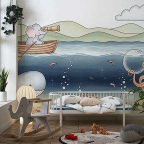 Elephant and whale ocean wallpaper transforming kids playroom into marine wonderland