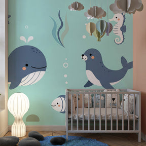 Underwater themed mural wallpaper creating peaceful kids bedroom with marine life decor