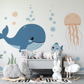 Underwater themed mural wallpaper creating peaceful kids bedroom decor with marine life