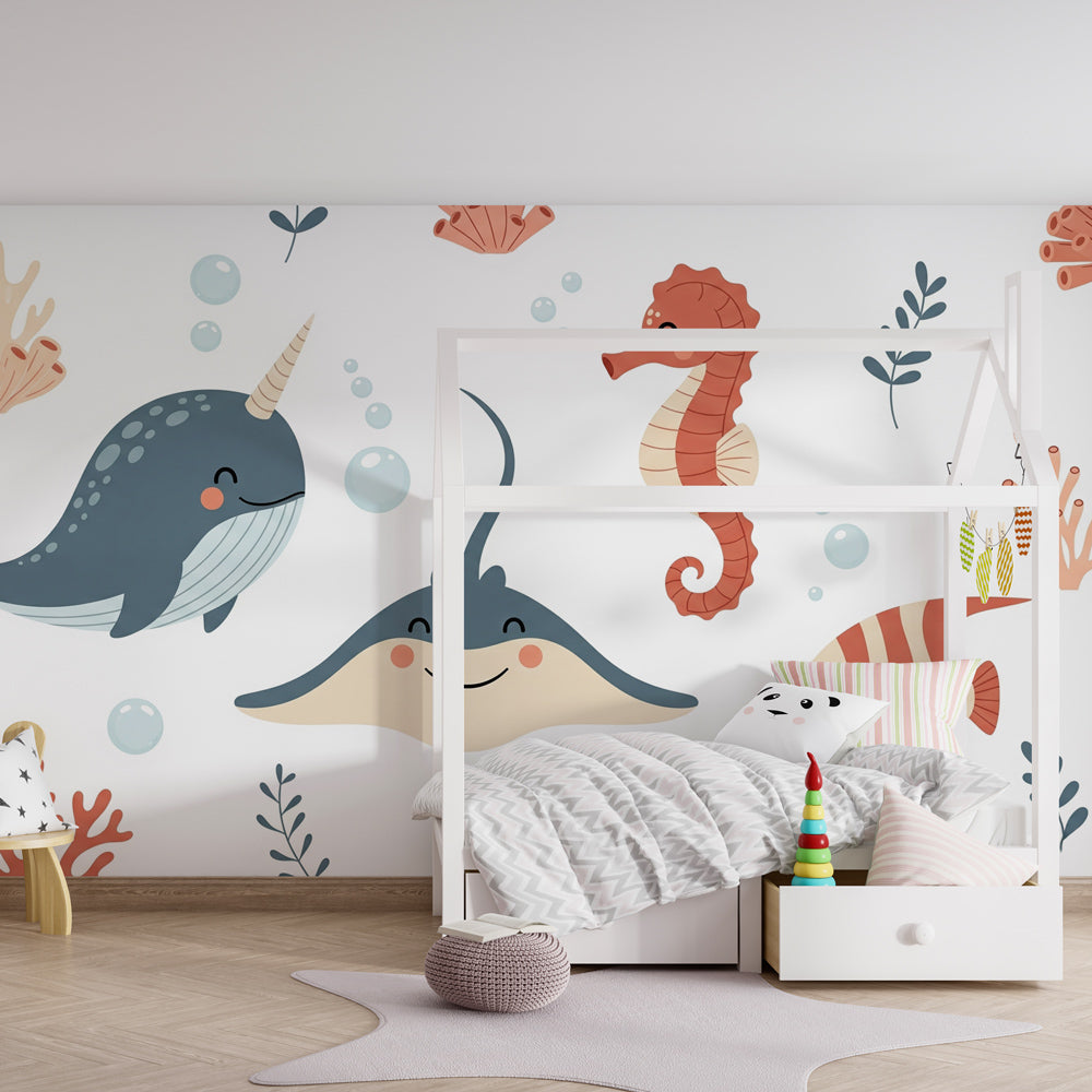 Marine adventure wallpaper in children's playroom featuring colorful sea creatures