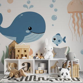 Colorful sea life wallpaper featuring whale and coral in children's playroom setting