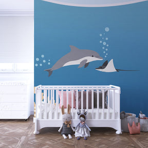 Underwater marine life wallpaper creating magical ocean theme in children's bedroom