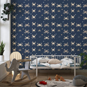 Marine themed children's bedroom featuring ocean crabs wallpaper with blue tones