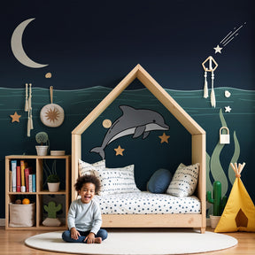 Ocean dolphin mural wallpaper in peaceful baby nursery with marine theme decor by Kids-Mundo