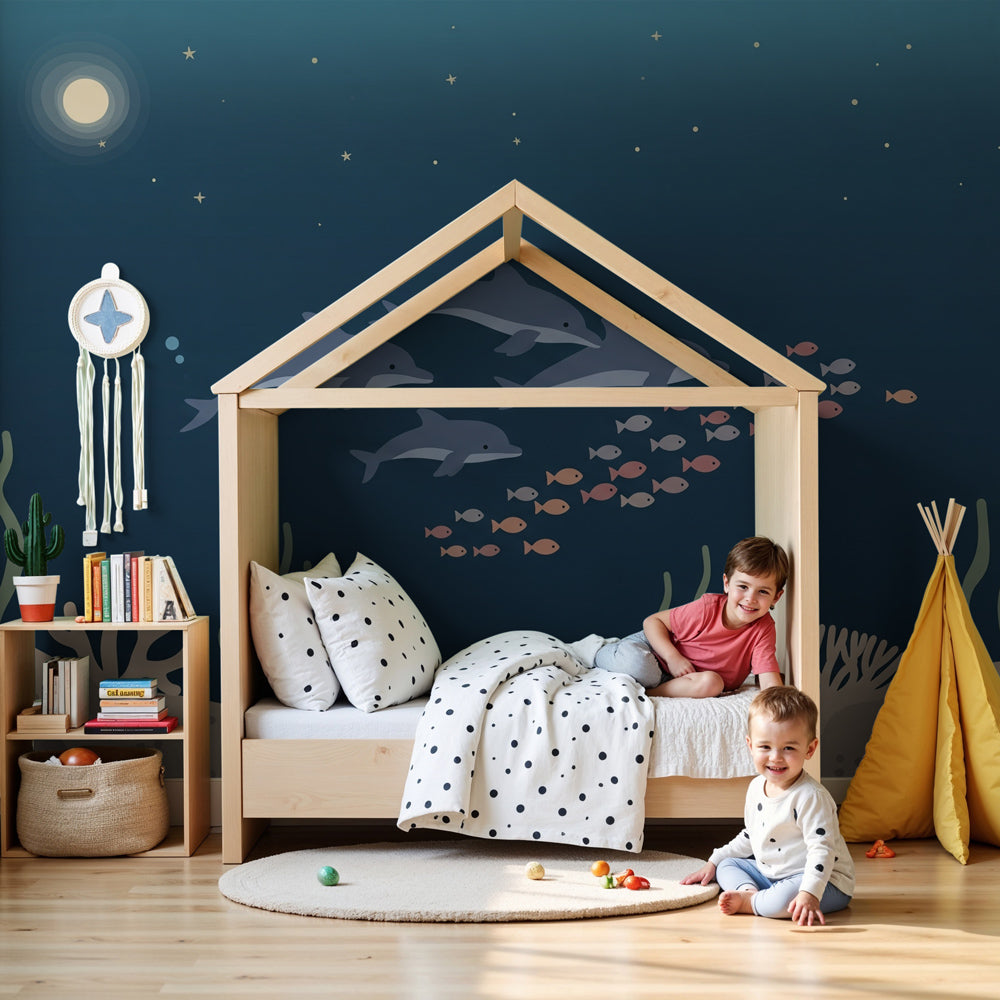 Ocean dolphins mural wallpaper in modern nursery with underwater marine life theme by Kids-Mundo