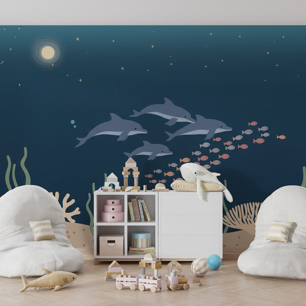 Marine life mural wallpaper with dolphins and colorful fish in children's playroom by Kids-Mundo