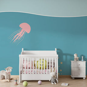 Turquoise jellyfish wallpaper complementing coastal themed kids room decor