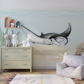 Manta ray wallpaper transforming children's playroom into serene ocean sanctuary