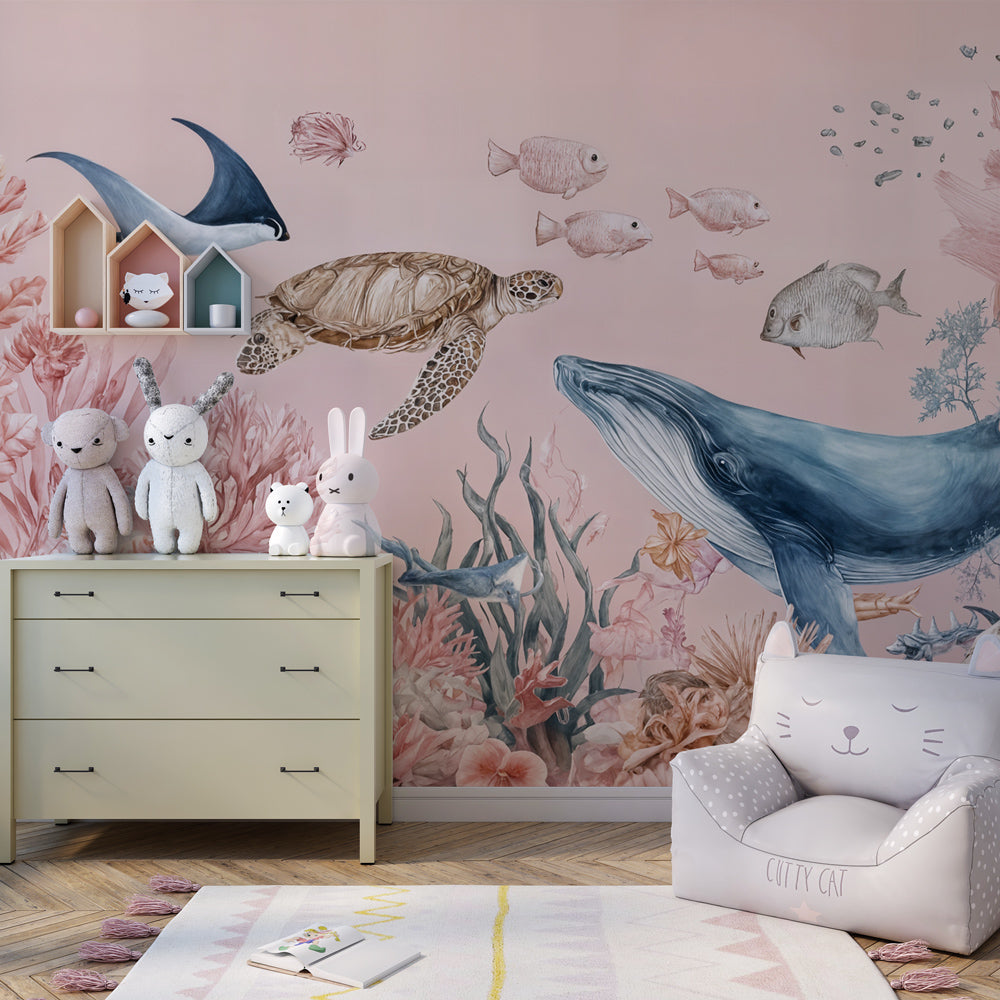 Marine life wallpaper featuring coral and tropical fish in soft pink kids room setting