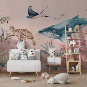 Underwater themed mural wallpaper creating serene children's bedroom decor with marine life