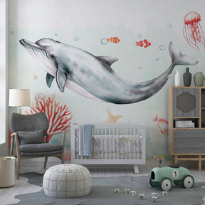 Underwater themed mural wallpaper creating magical kids bedroom with marine life