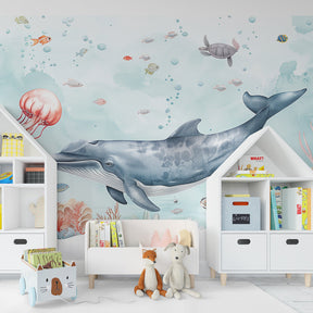Whale and coral mural wallpaper transforming kids playroom into ocean sanctuary
