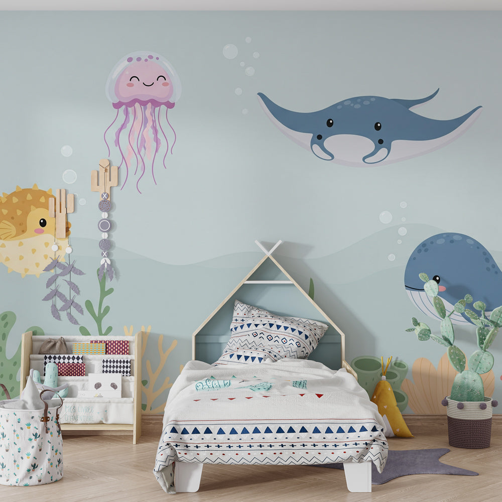 Joyful ocean wallpaper with whales and jellyfish in bright kids playroom setting